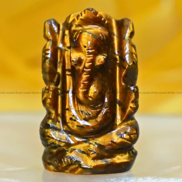 Tiger Eye Crystal Pocket Ganesha – 1inch (Grounding & Stability)